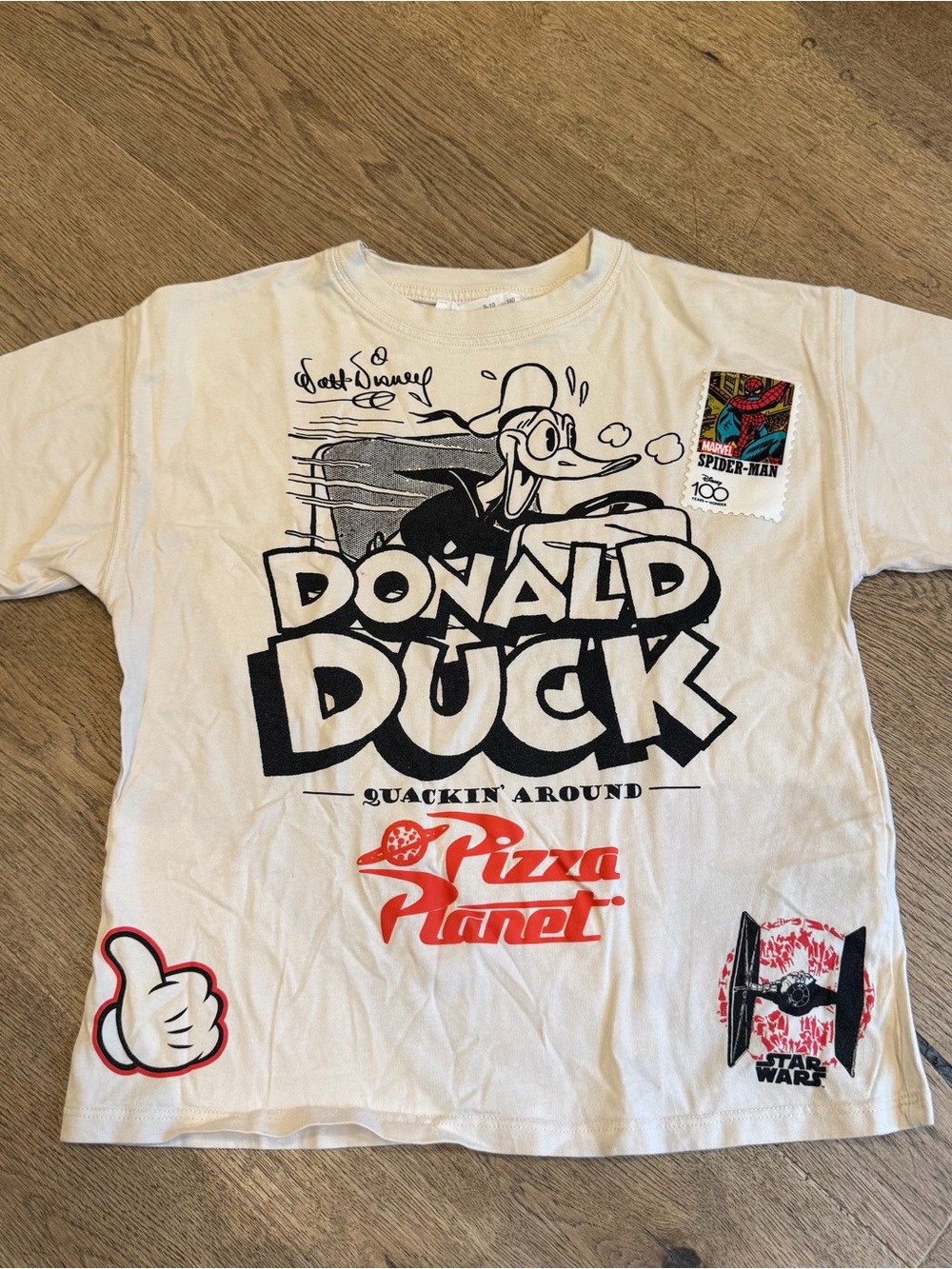 Disney Donald Duck Pizza Planet Graphic Tee - White with Black & Red Prints